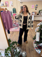 Load image into Gallery viewer, Black &amp; White Bow Cardigan
